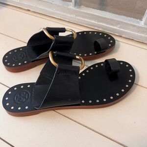 Tory Burch black leather sandals with gold detail